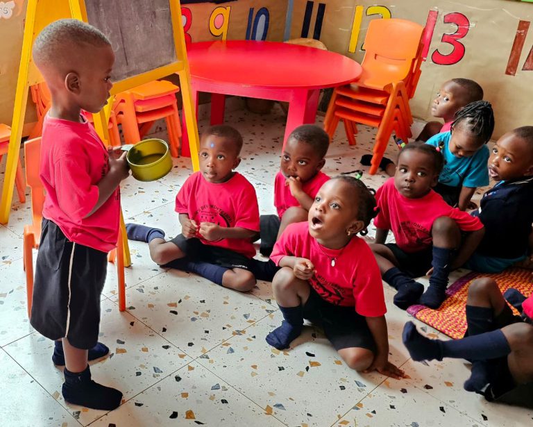 Kid leading others while learning